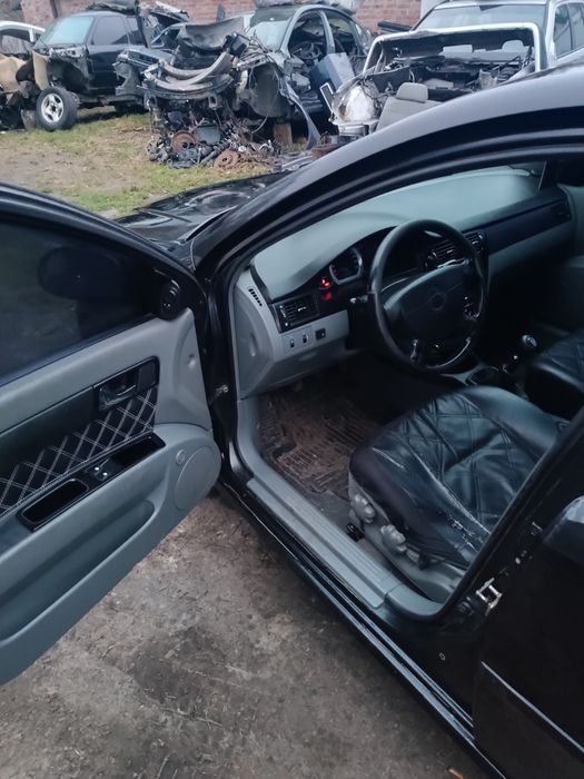 Розбірка ,запчастини Chevrolet lacetti,капот,двері,крила, двигун.