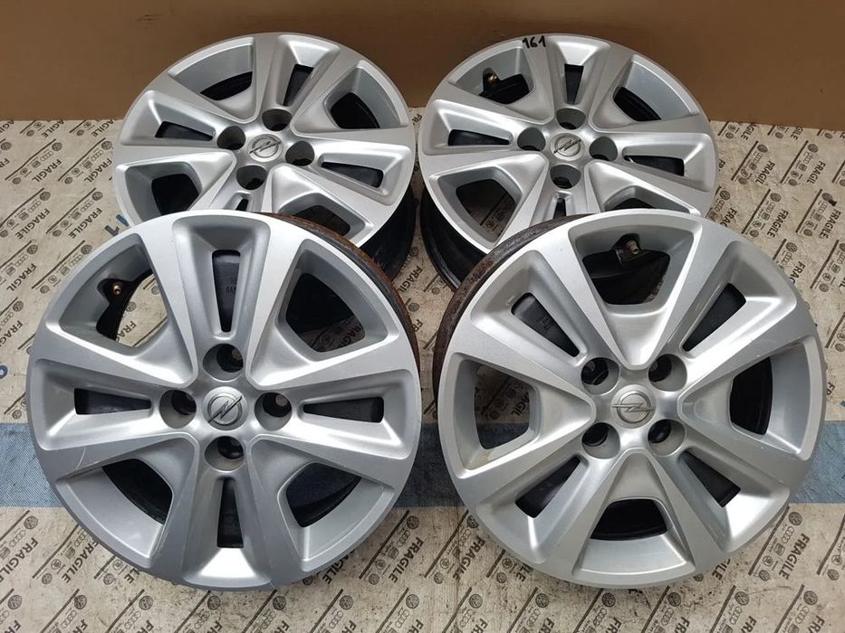 Felgi strukturalne kołpaki czujniki tpms Opel Corsa  D E Adam Fiat Gra