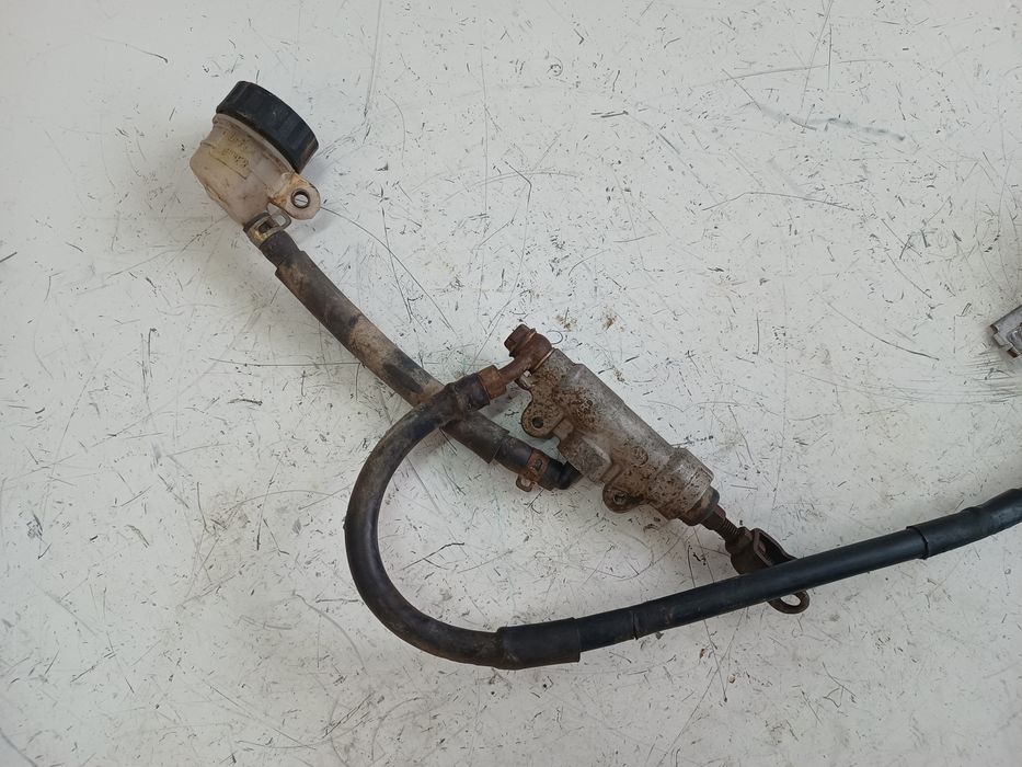 Zacisk hamulcowy tył tylny pompa hamulcowa tył Suzuki RM 125 / 250 95r