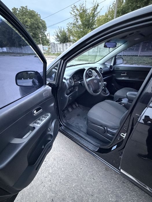Kia Carens 2009 - 2.0 бензин