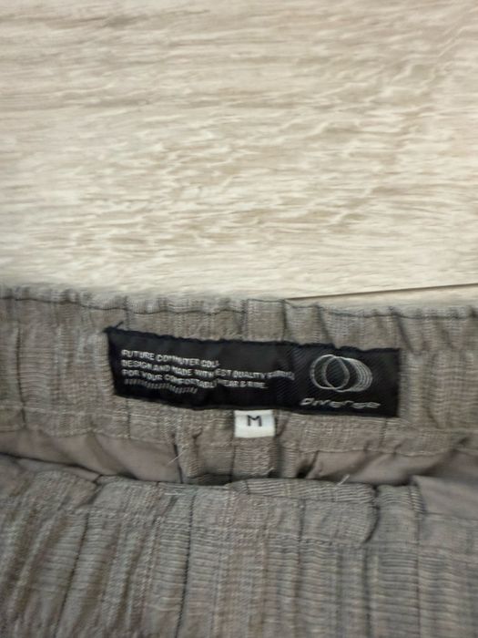 Klasyczne spodnie materialowe w krate meskie stan bardzo dobry rozm. M