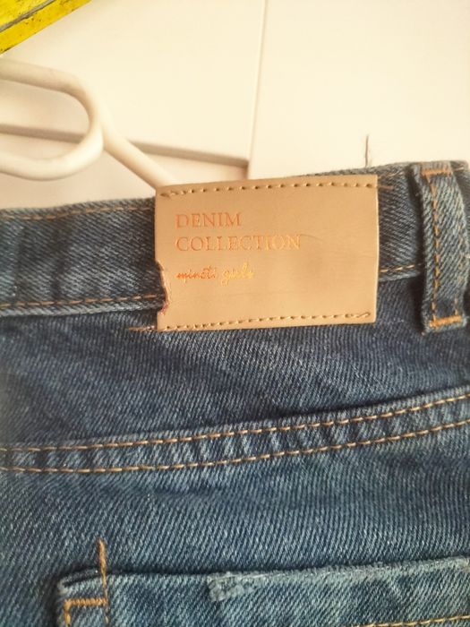 Nowe spodnie jeansowe 140/146