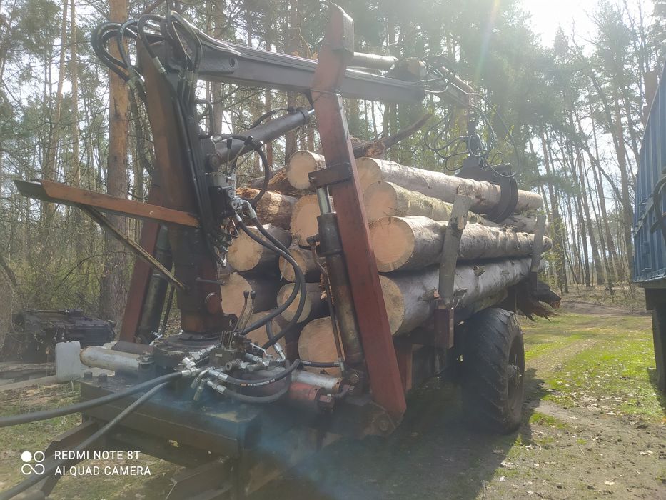 Прицеп з маніпулятором.