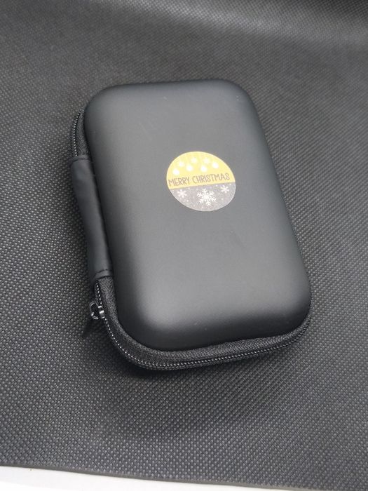 Isqueiro Estilo Zippo absolutamente Novo com bolsa.