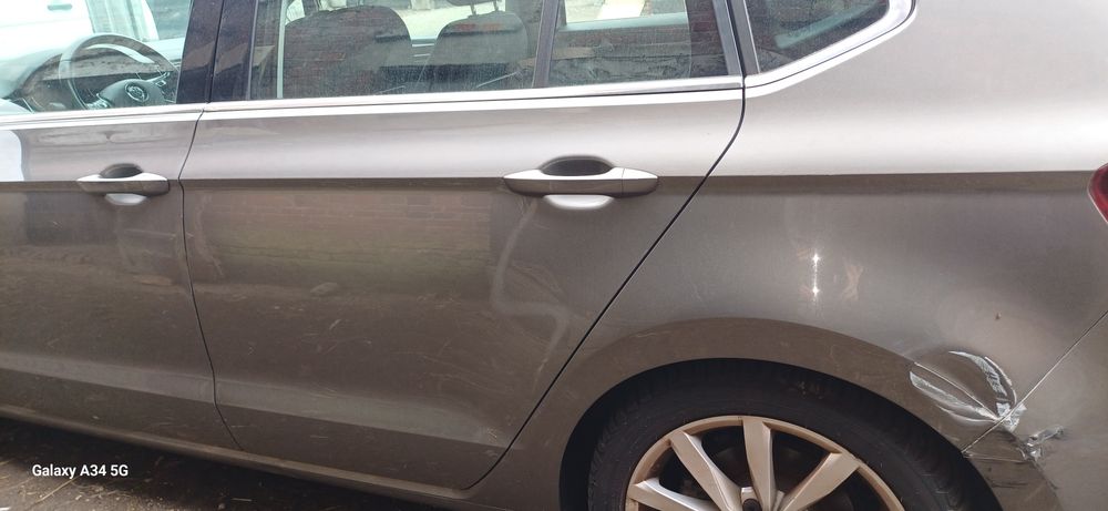 Drzwi prawe tylne  błotnik wolkswagen sportsvan LA7N