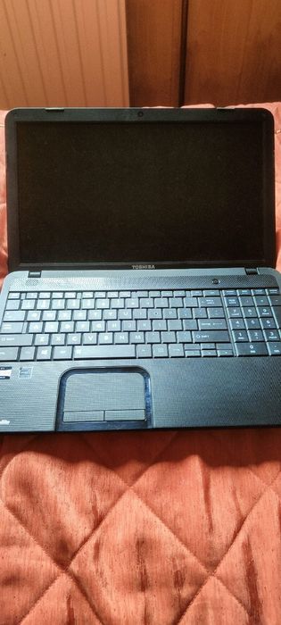 Laptop Toshiba PSCBQU-001005B AMD E1. 4GB 320GB