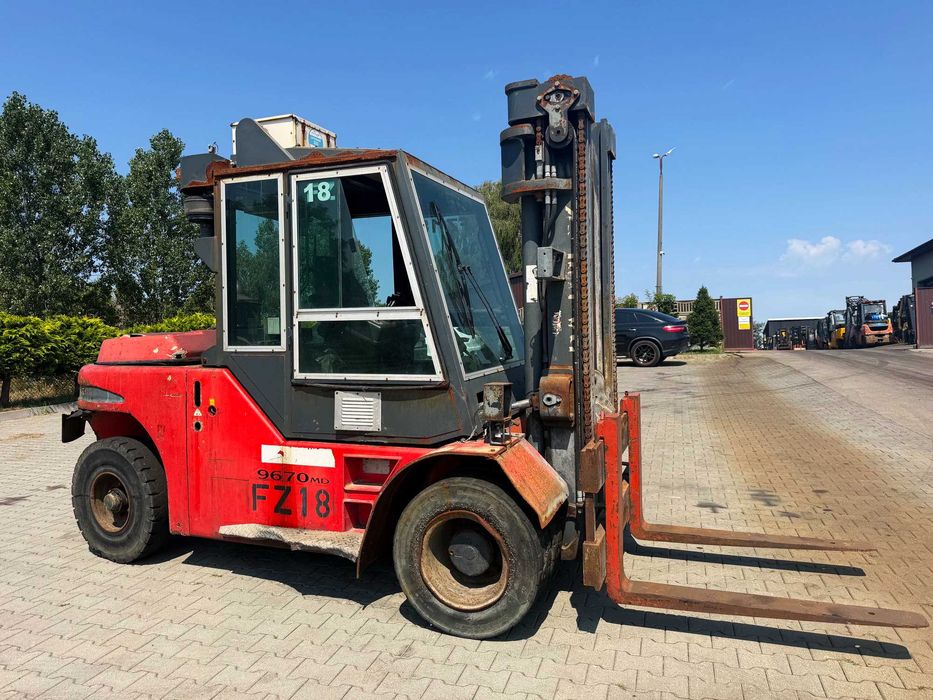 wózek widłowy DANTRUCK 9670 udźwig 7000kg kabina 4-sekcja bliźniacze koła 2003 rok KALMAR Hyster