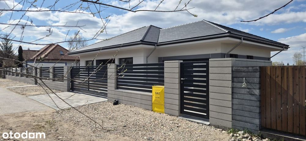 Nowoczesny dom parterowy, dwustanowiskowy garaż, działka 1000m2