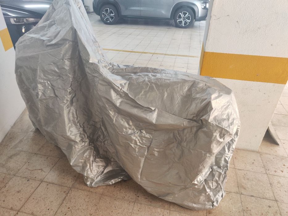 Capade mota impermeavel