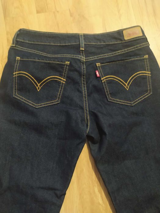 Granatowe damskie jeansy Levi's legging 30/32
