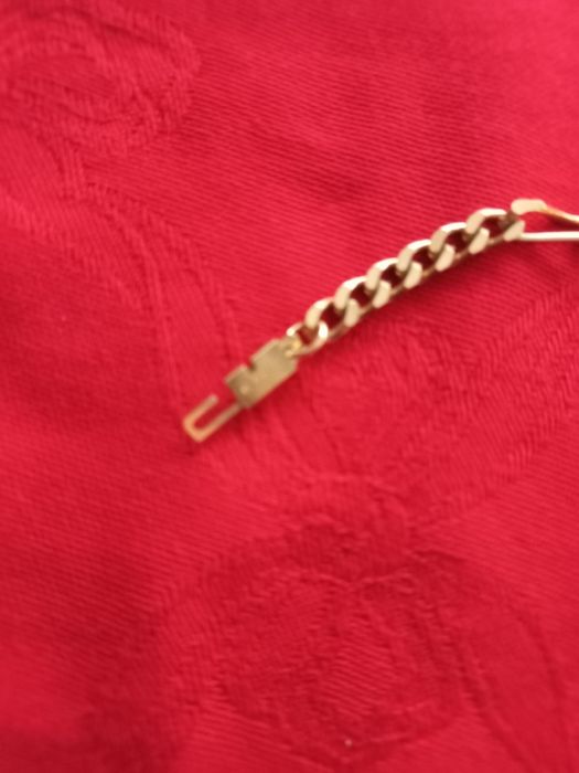 Pulseira dourada,  malha batida, marca Shock