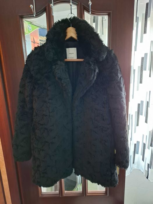 Kispos e casaco pelo