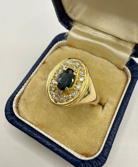 Złoty pierścionek 750 z szafirem 0,50ct i diamentami 0,25ct