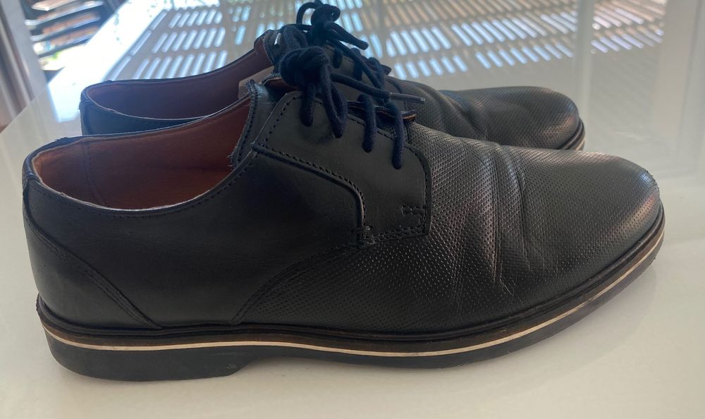 Calçado clássico de homem