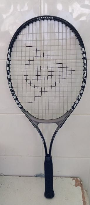 Raquete tênis dunlop junior 25 200g. 
Trás a Bolsa.

OBS: A Raquete te