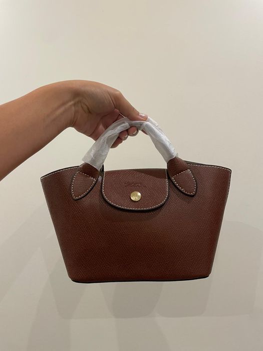 Mala longchamp castanha em pele