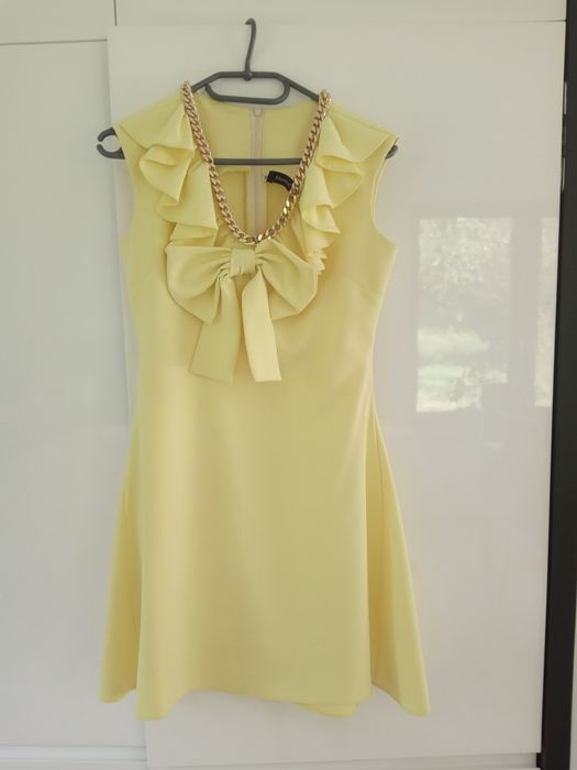 Sukienka Marelina żółta, pastelowa, kokarda, asymetryczna, złota