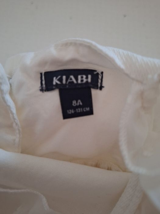 Casaco e vestido Kiabi