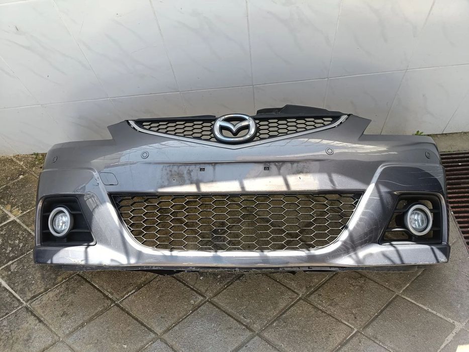 Para choques Mazda 5 2009