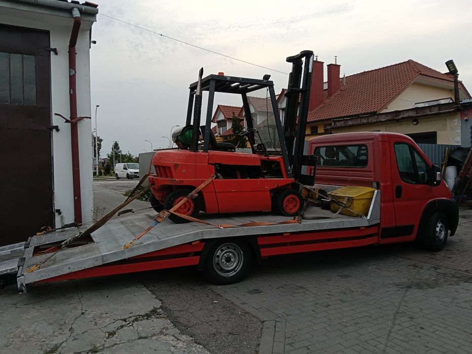 Pomoc drogowa 24/7 holowanie transport maszyn  wulkanizacja