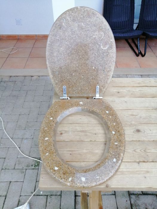 Tampo de sanita em resina