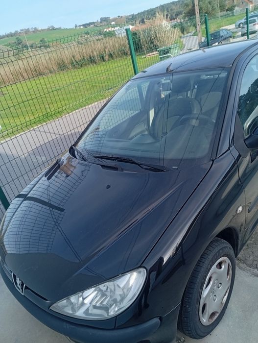 Peugeot 206       2005 a gasolina  leia a descrição