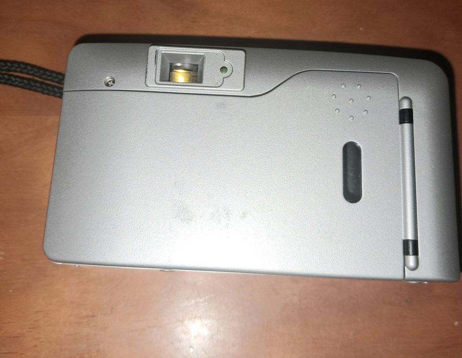 Máquina fotográfica com bolsa