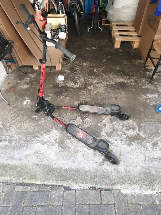 Trotinete usada abrir e fecha