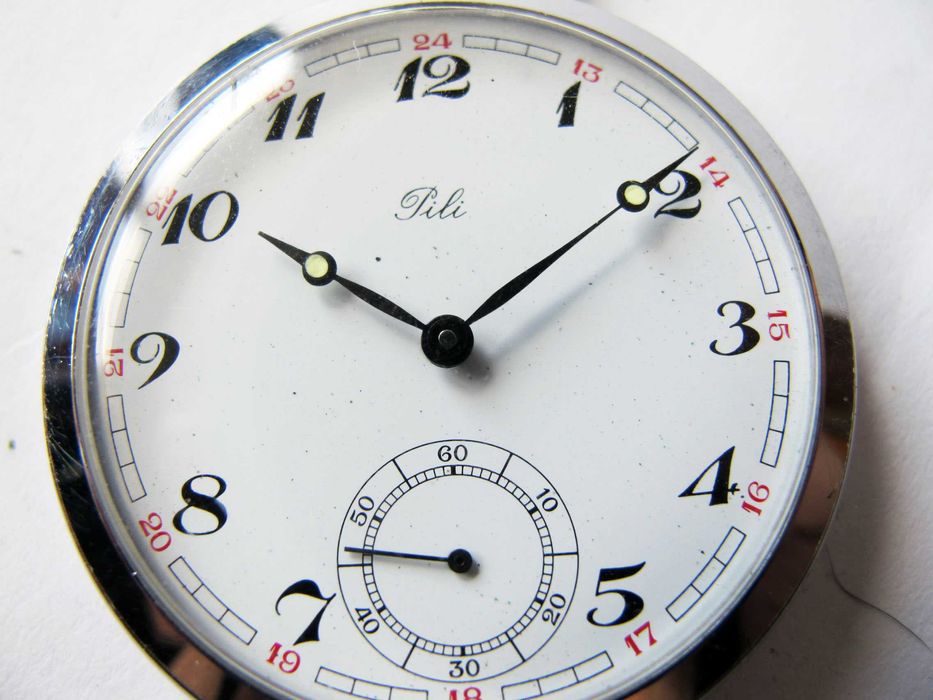 PILI.  Zegarek kieszonkowy.