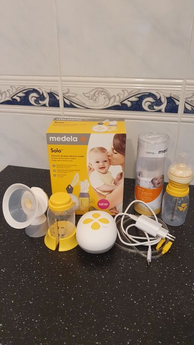 Selling Medela Solo Breast Pump + Baby Bottle