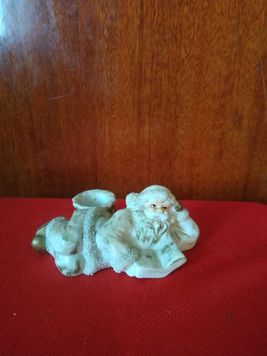 Коллекционная фарфоровая статуэтка " Дед мороз."