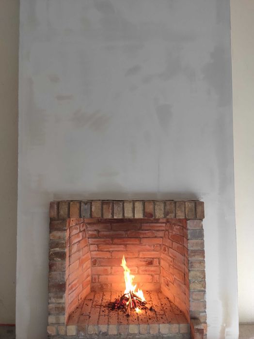 Kominek otwarty palenisko szamotowe otwarte Warszawa z cegły zdun