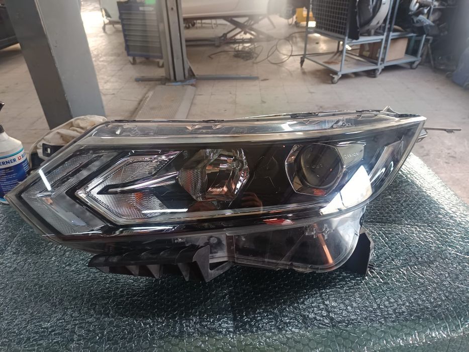 Farol Esq Nissan qashqai