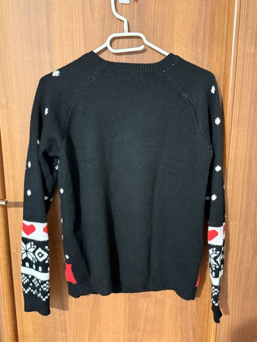Świąteczny sweter z reniferem