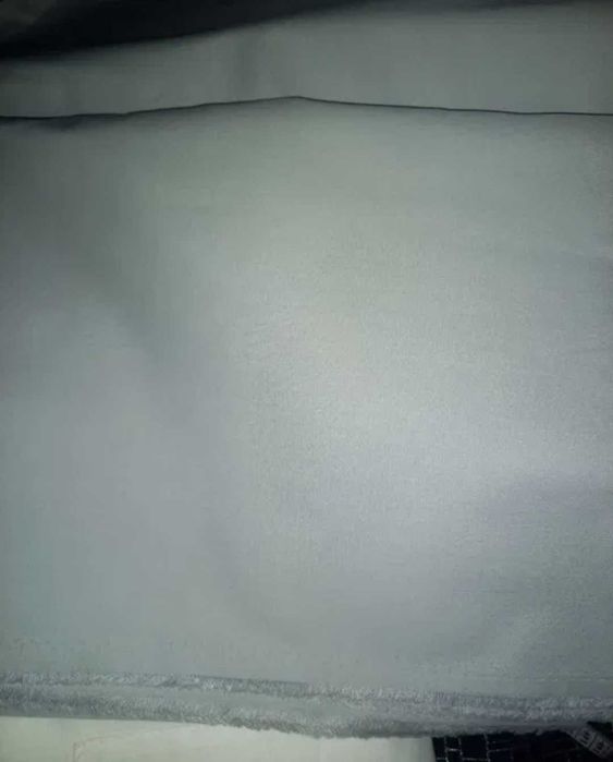 Тканина  світло сірого кольору