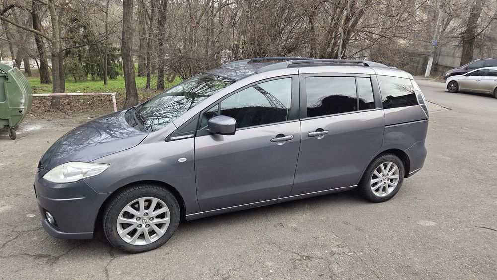 Продам Мazda 5 у гарному стані. Технічно повністю обслужена, грошей на авто не шкодували. По ходовій частині зроблено все: замінено амортизатори, опорні підшипники та наконечники. Їде м'яко, без сторонніх звуків.
Двигун та коробка працюють відмінно. Салон чистий та доглянутий. Сів і поїхав