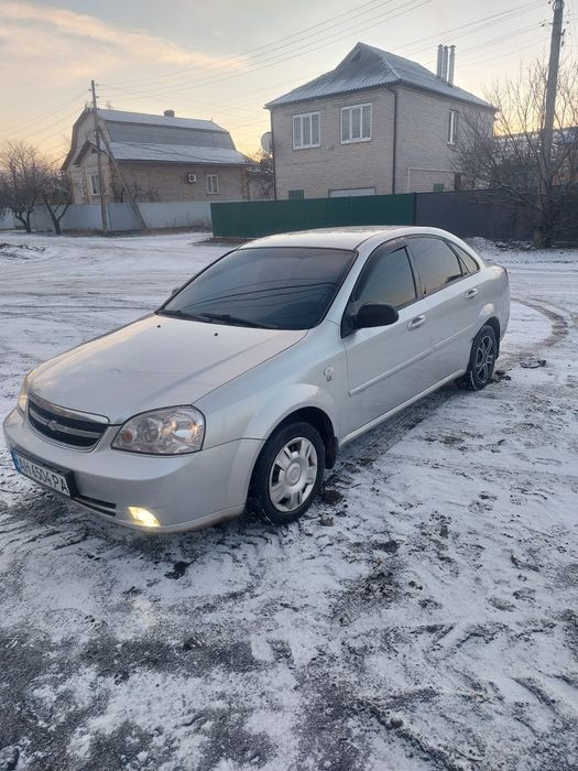 Лачетти 1.6 газ,бензин.