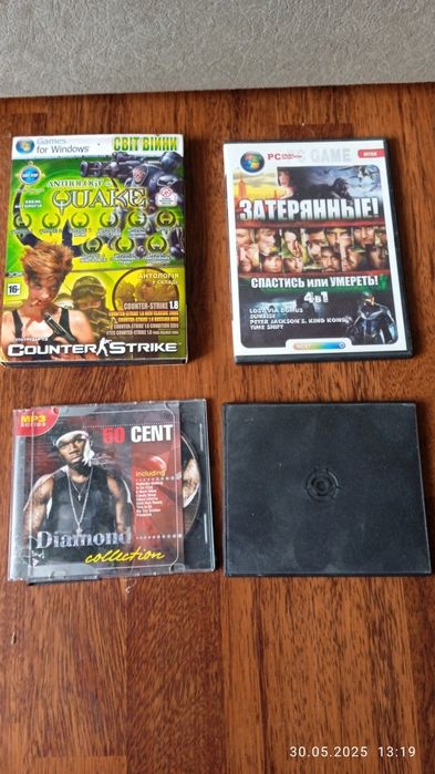 Компьютерная игра и музыка на компакт дисках.