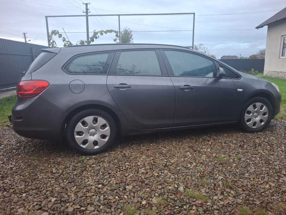 Опель Астра J 2011