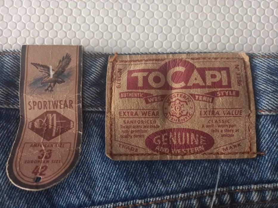 Calças de homem, ganga, marca Tocapi, T42. Novas c/etiq.
