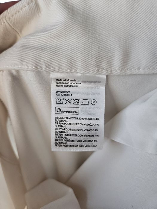 Eleganckie kremowe spodnie damskie H&M proste nogawki wysoki stan XS ś