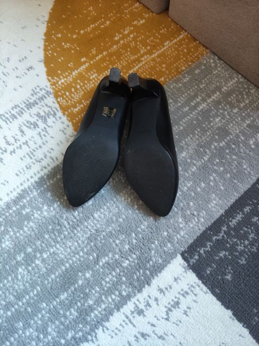Buty na obcasie .