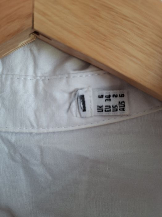 Elegancka biała koszula z szerokimi rekawami