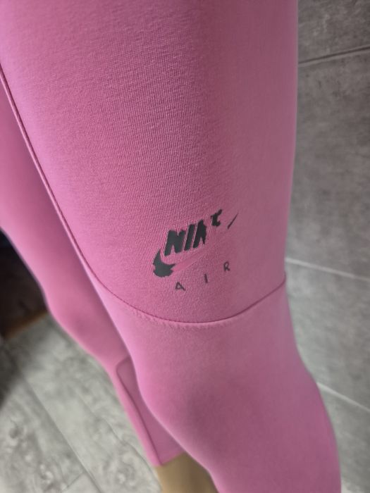 Leginsy różowe Nike rozm L