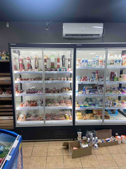 Стелажі в магазин, касові прилавки, холодильники