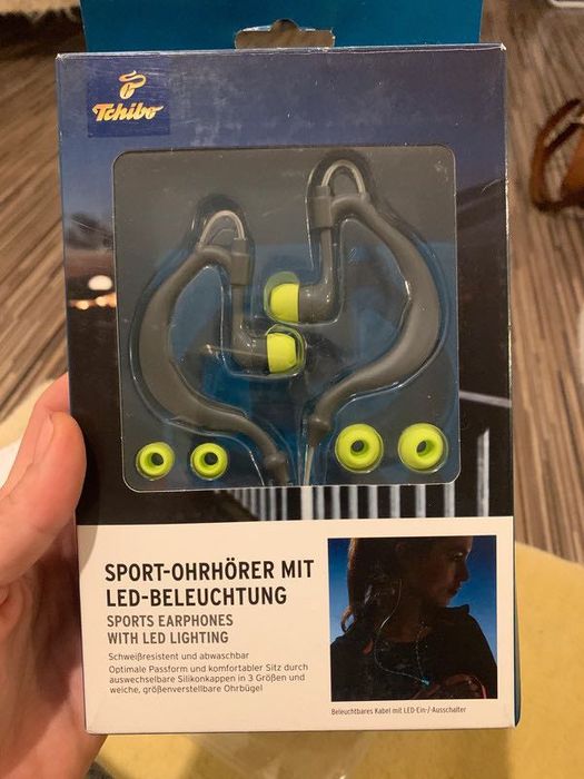 Nowe, zapakowane słuchawki z podświetleniem LED