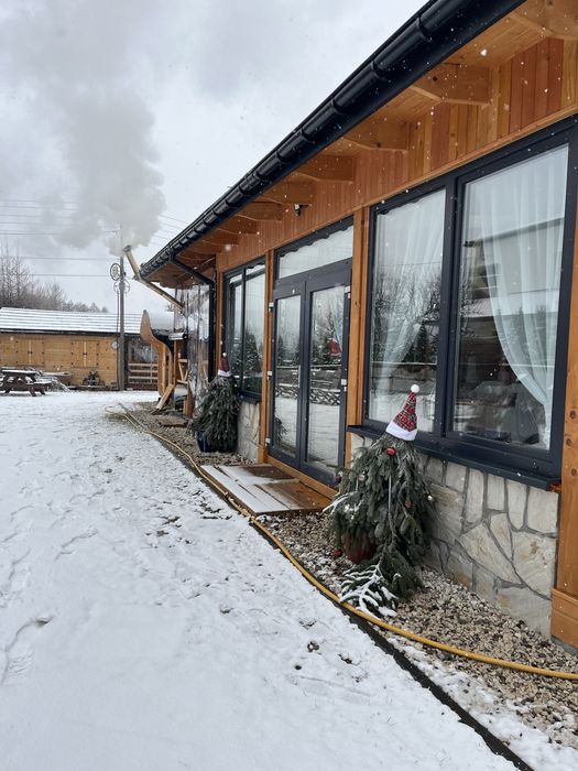 "Drewniany dom w stylu góralskim"