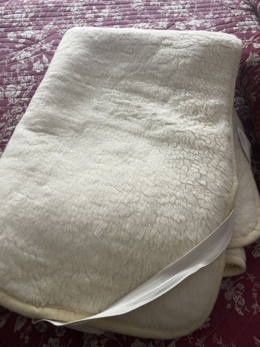 Manta e protetor de colchão em lã de merino