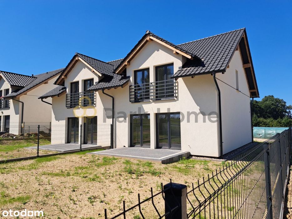 Dom w zabudowie bliźniaczej z garażem