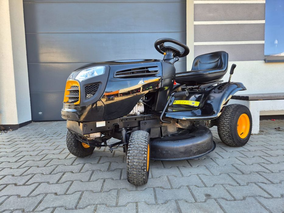 Traktorek ciagniczek kosiarka Mcculoch (Husqvarna)Briggs manual boczny wyrzut